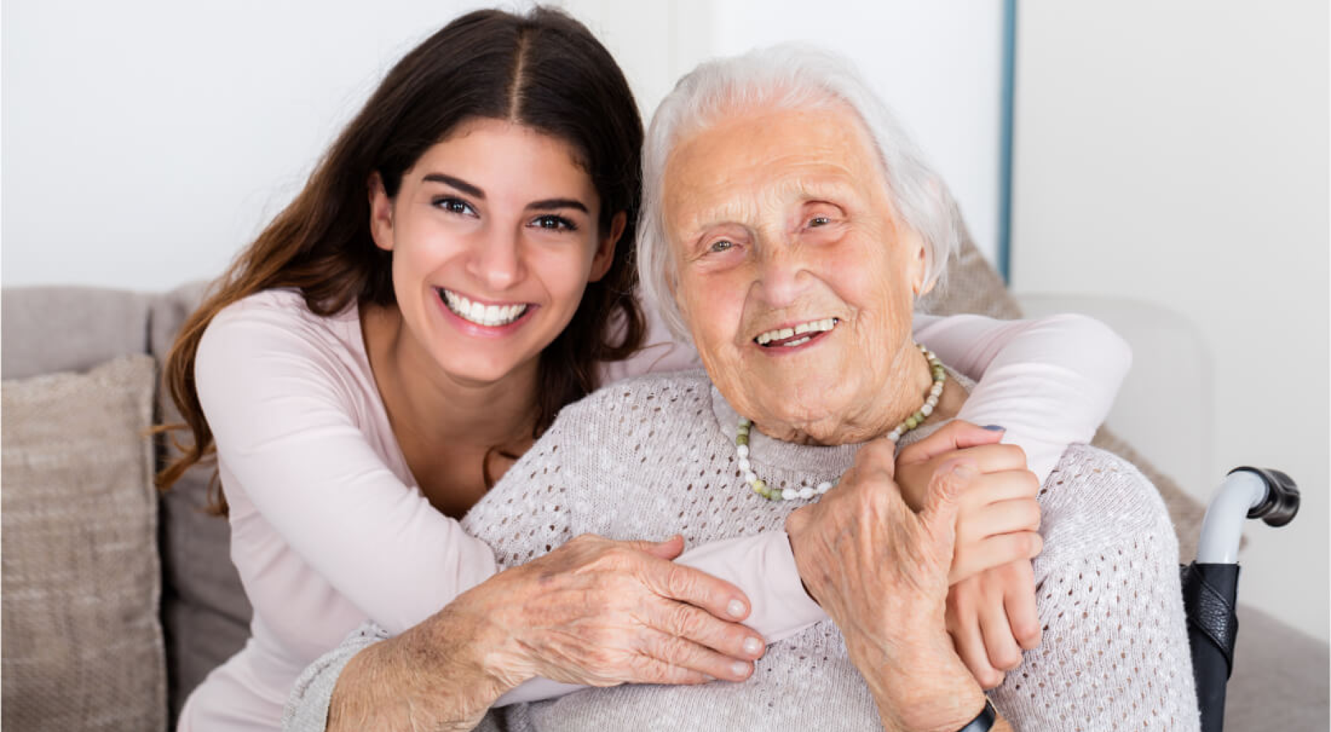 Elderly lady happy to be with her caregiver
